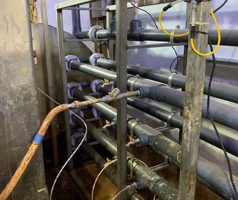 A bunch of pipes are connected to each other in a factory.