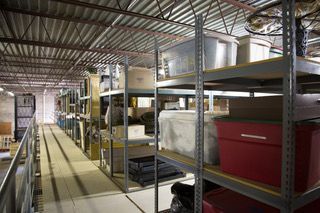 A warehouse filled with lots of shelves and boxes.