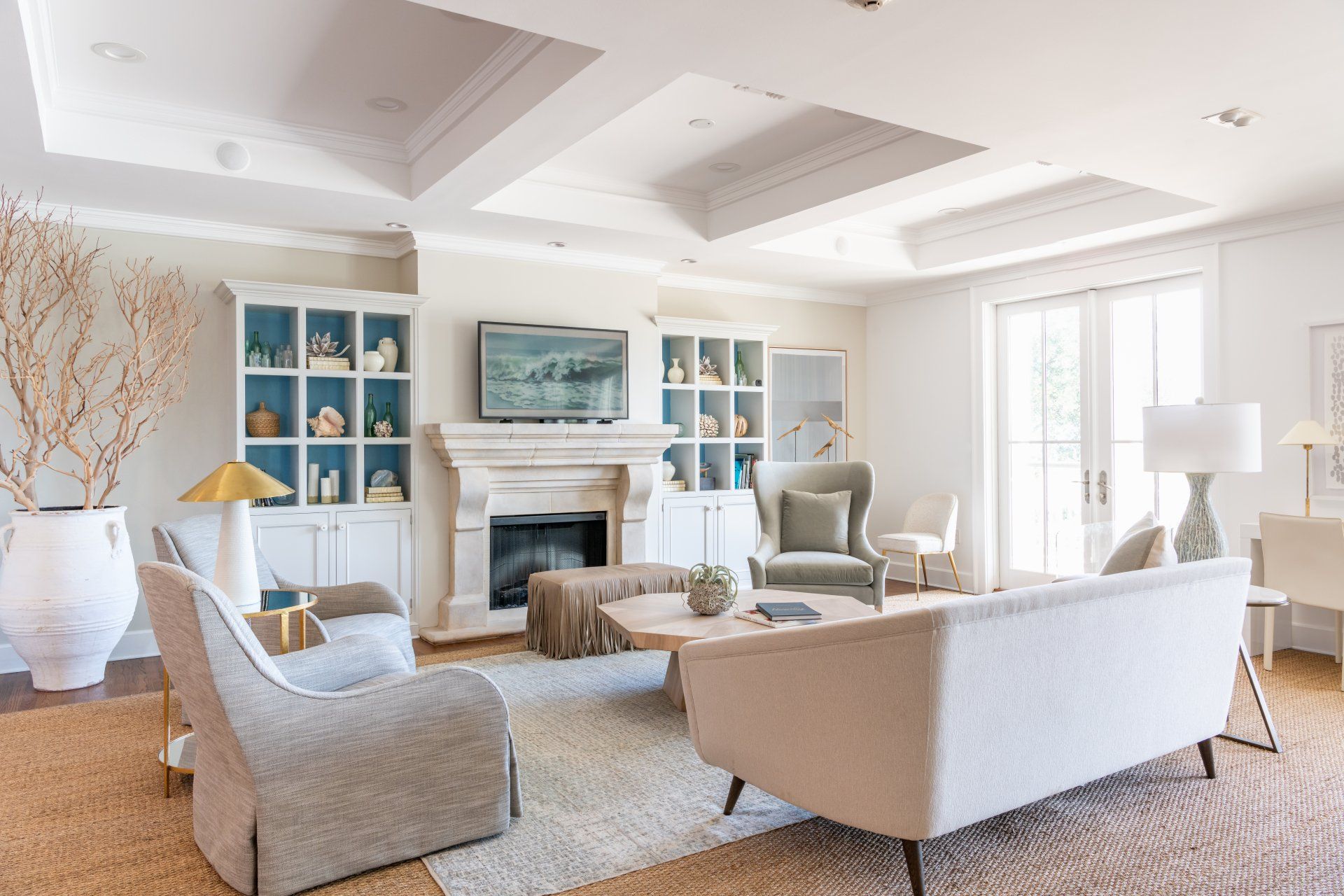 A boutique hotel lobby filled with furniture and a fireplace