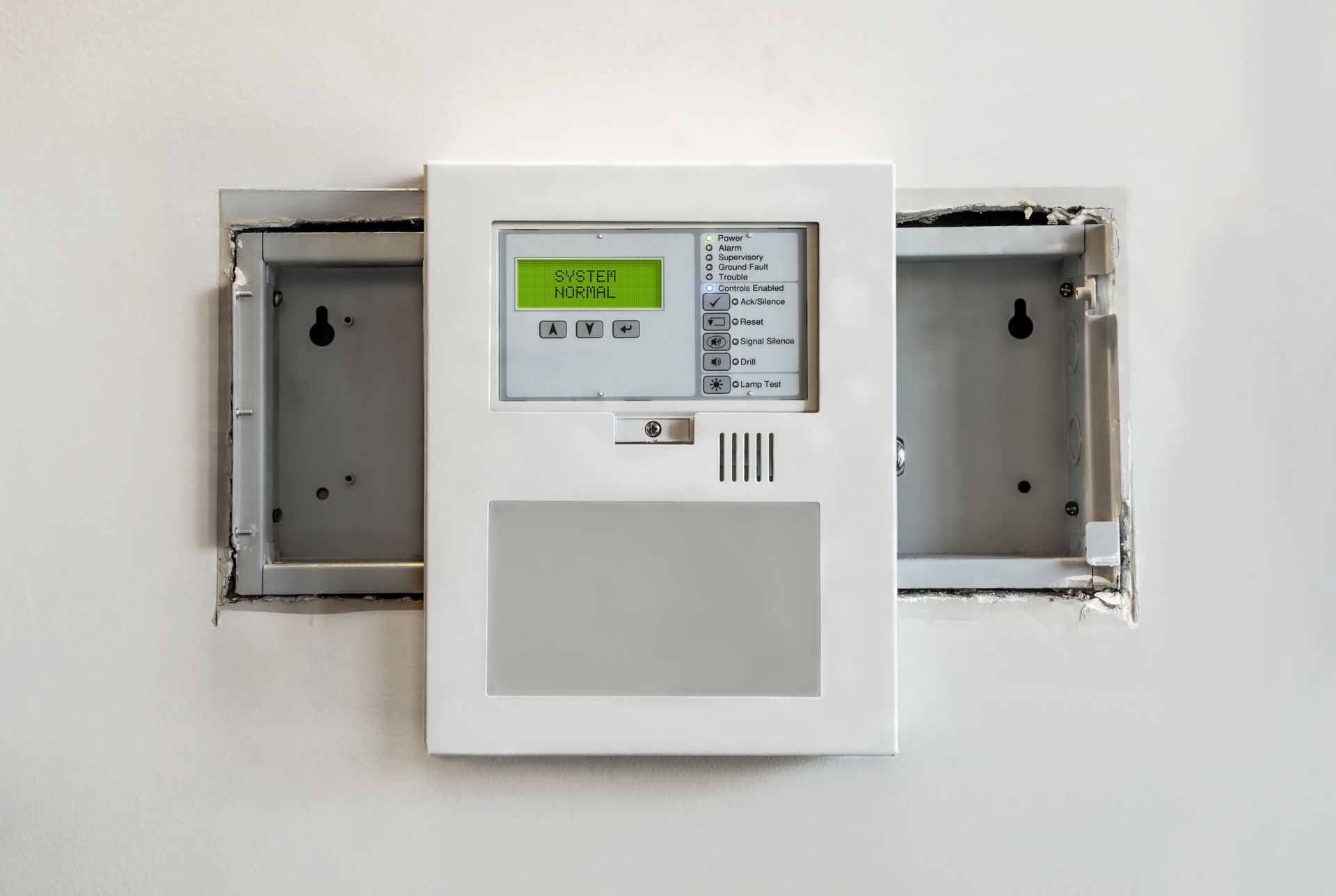 Wall-mounted electrical panel with a digital display and open side compartments