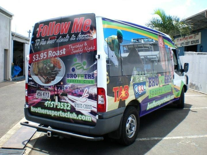 A Van that Says Follow Me Is Parked in A Parking Lot — Signmax Bundaberg In Kensington, QLD