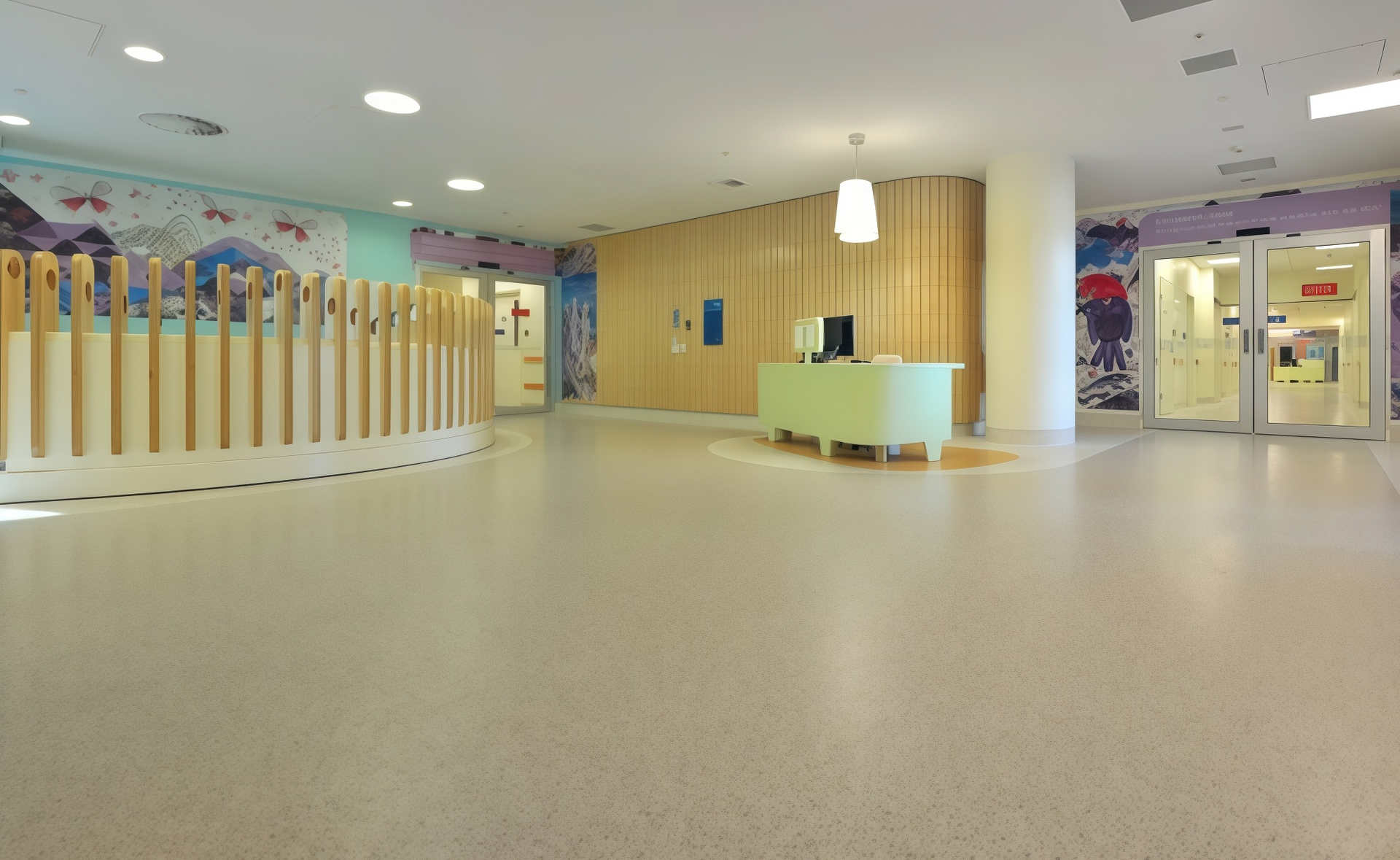 Empty modern lobby with a reception desk, striped partition, and glass entrance doors