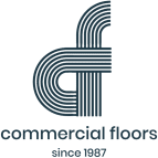 Logo for Commercial Floors featuring a stylized letter
