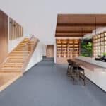 Modern minimalist interior with staircase, shelves, and a long counter in a bright open room