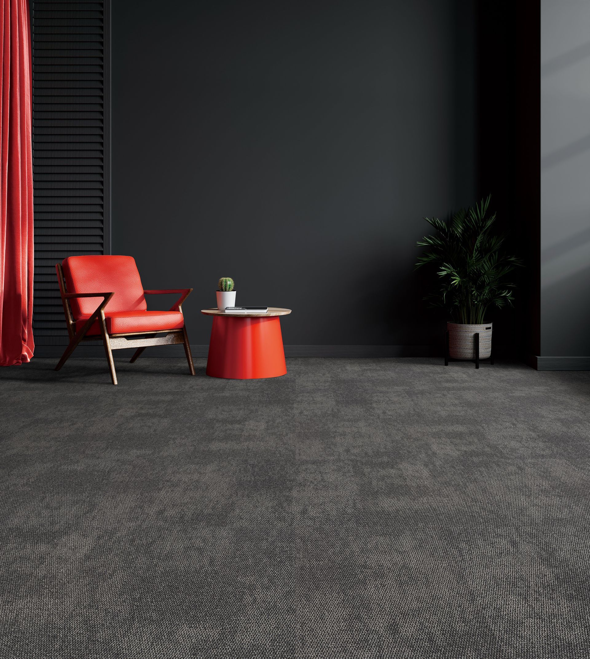 Red chair and small red table in a dark modern room with patterned carpet and a potted plant.
