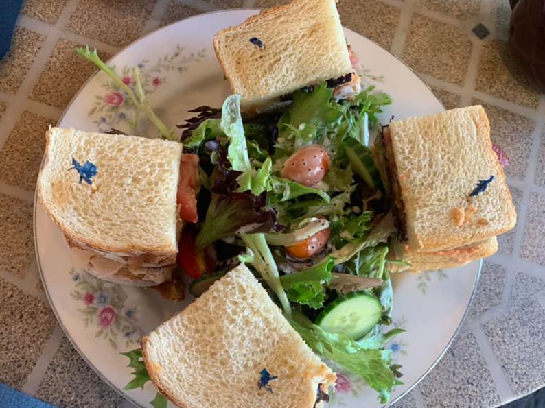 Turkey Bacon Club sandwich and a salad.