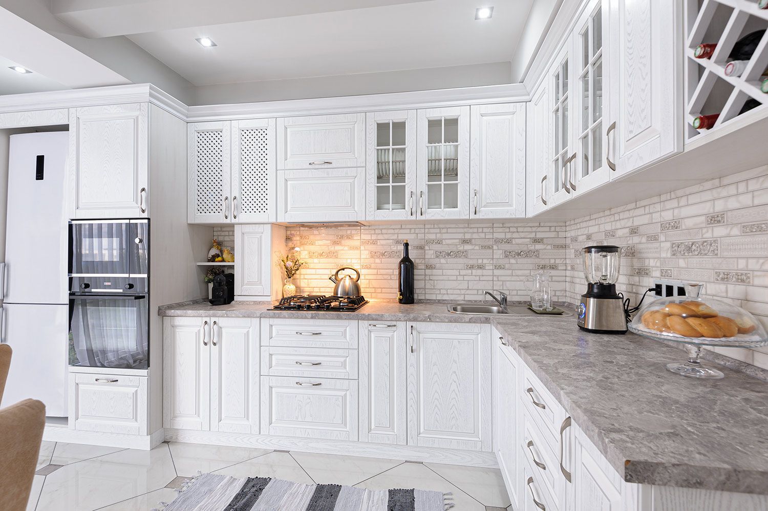 Modern kitchen with gray marble countertops