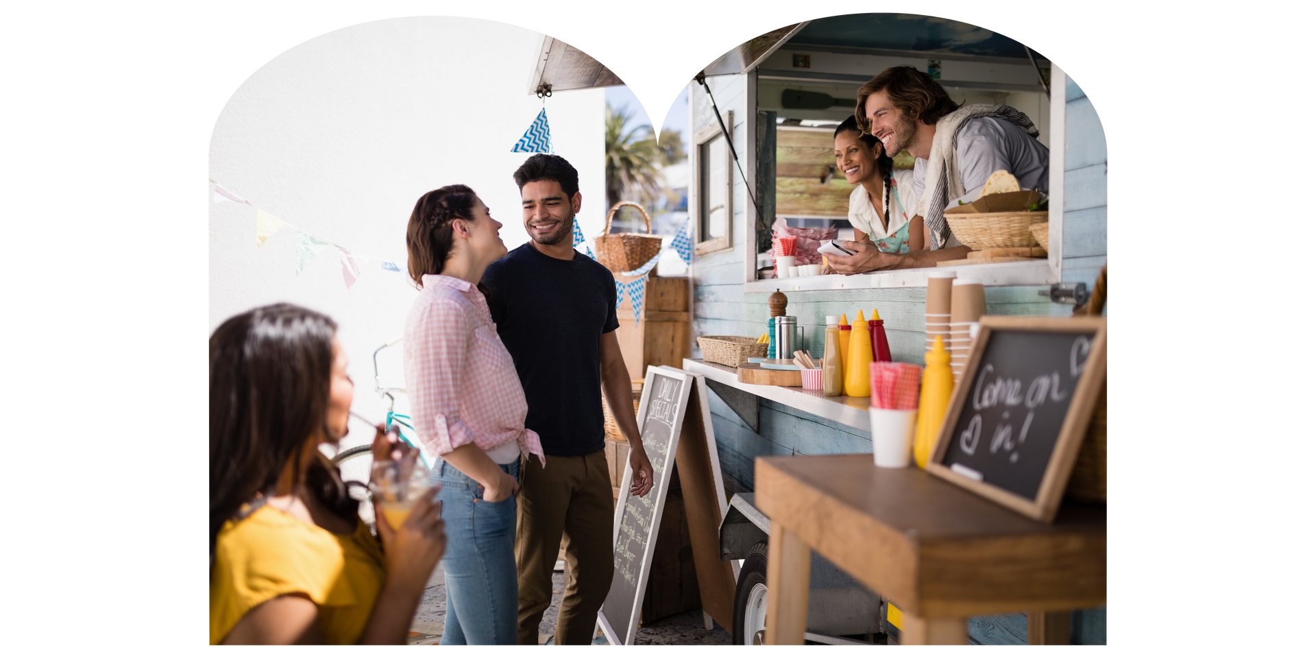 People ordering food at a food truck. 