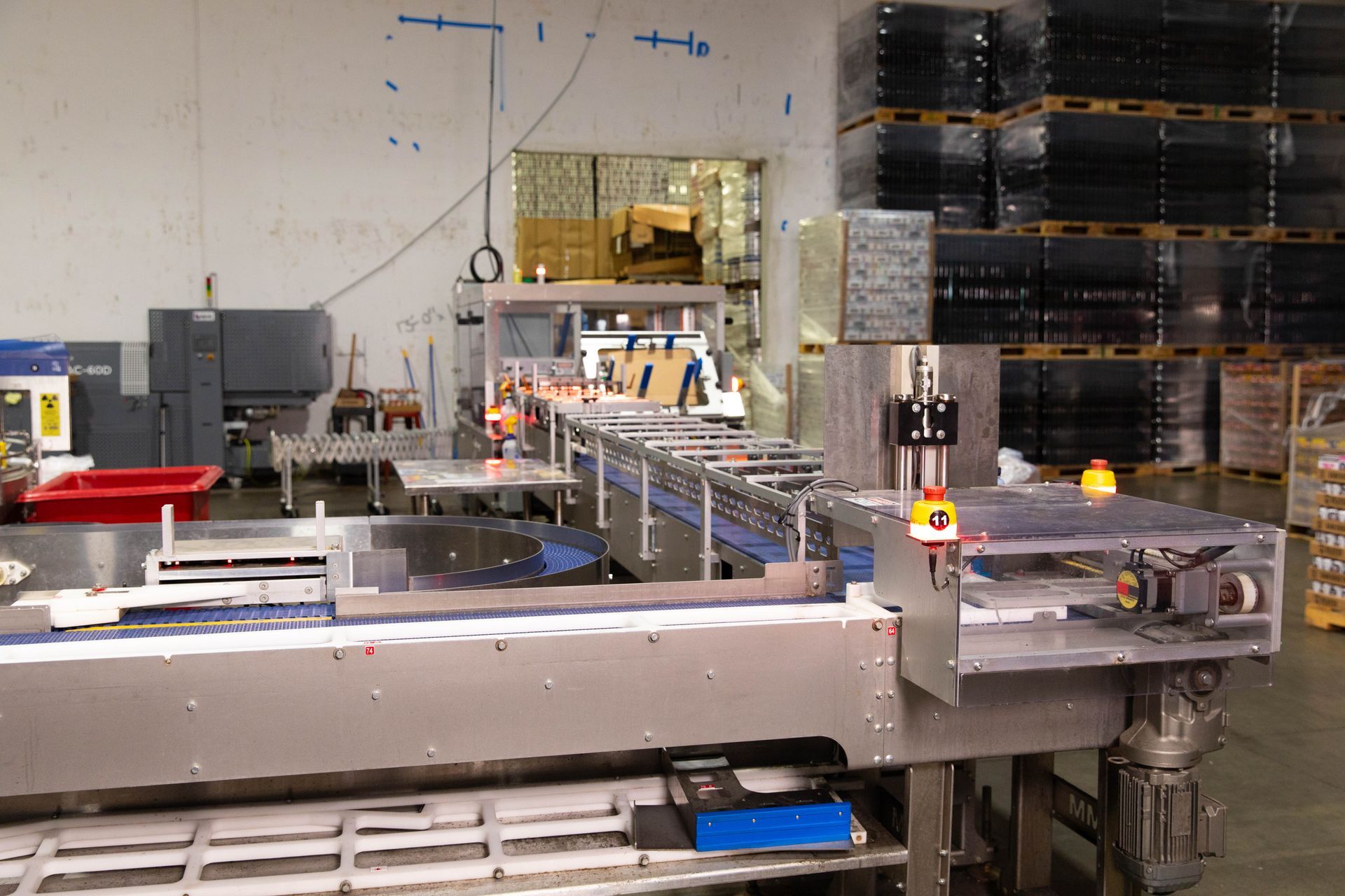 a warehouse filled with lots of machinery and boxes