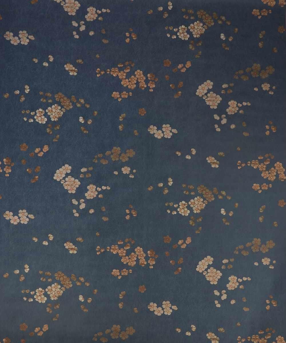 A dark blue background with flowers on it