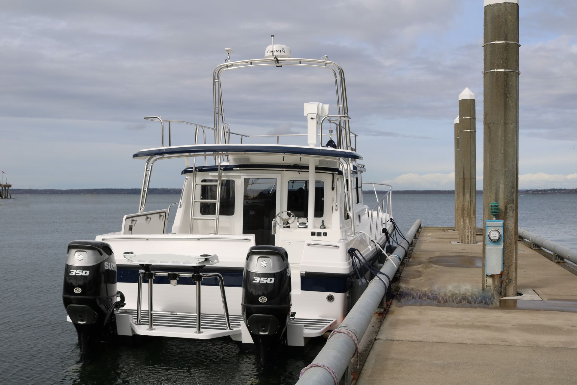 Roof Top Radar Arch by Tanner Manufacturing on a Sea Sport 32 Pacific Cat Boat