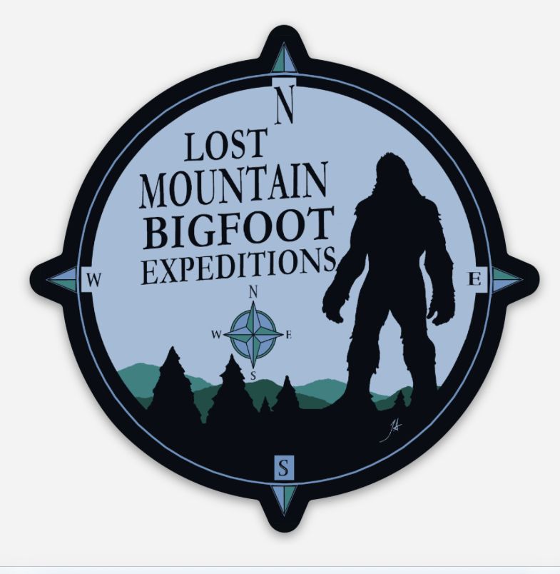 Lost Mountain Bigfoot Expeditions logo with Bigfoot silhouette, compass, and mountain scene