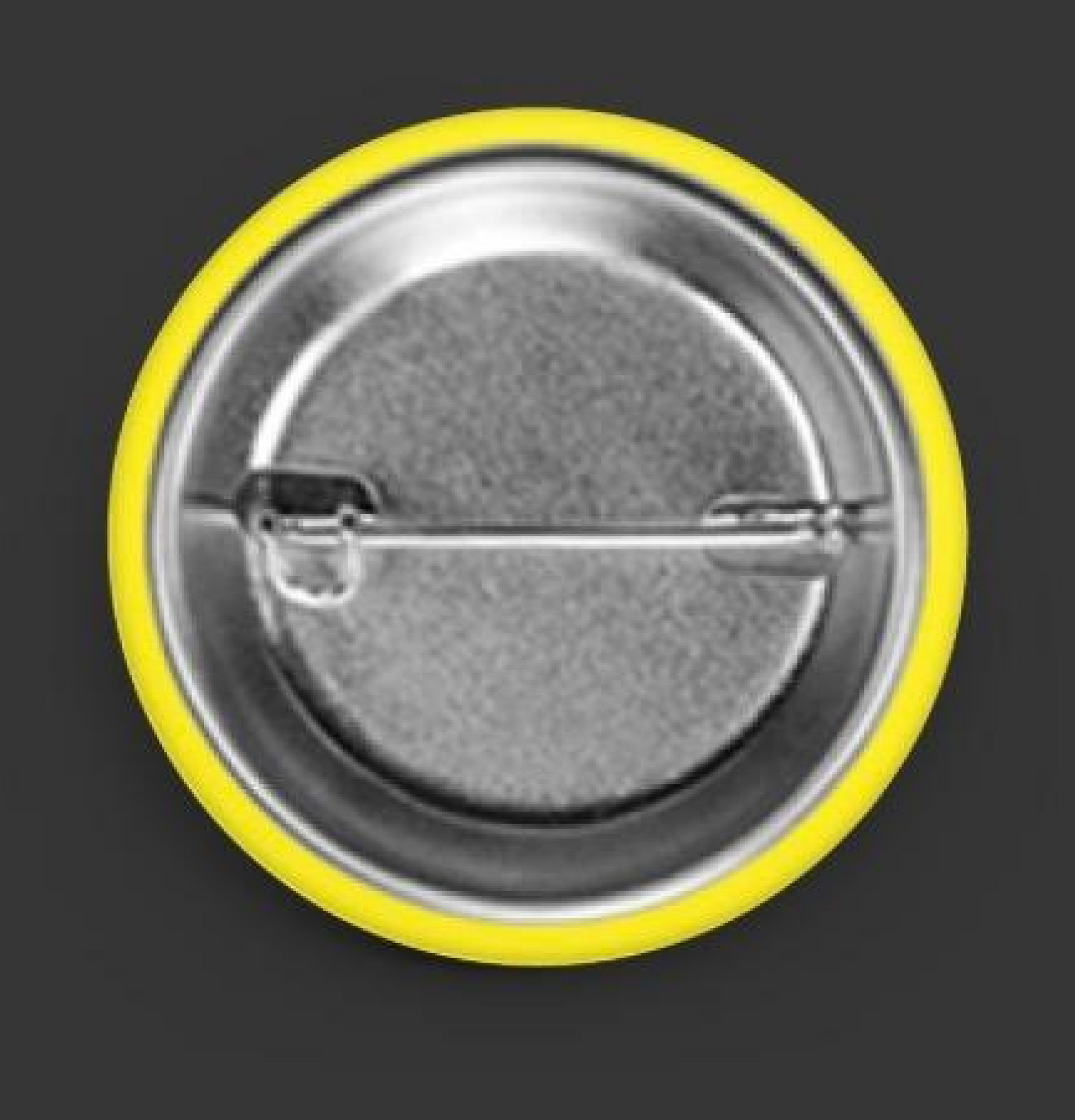 Round silver metal cap with a horizontal slot, outlined by a yellow ring on a dark gray background