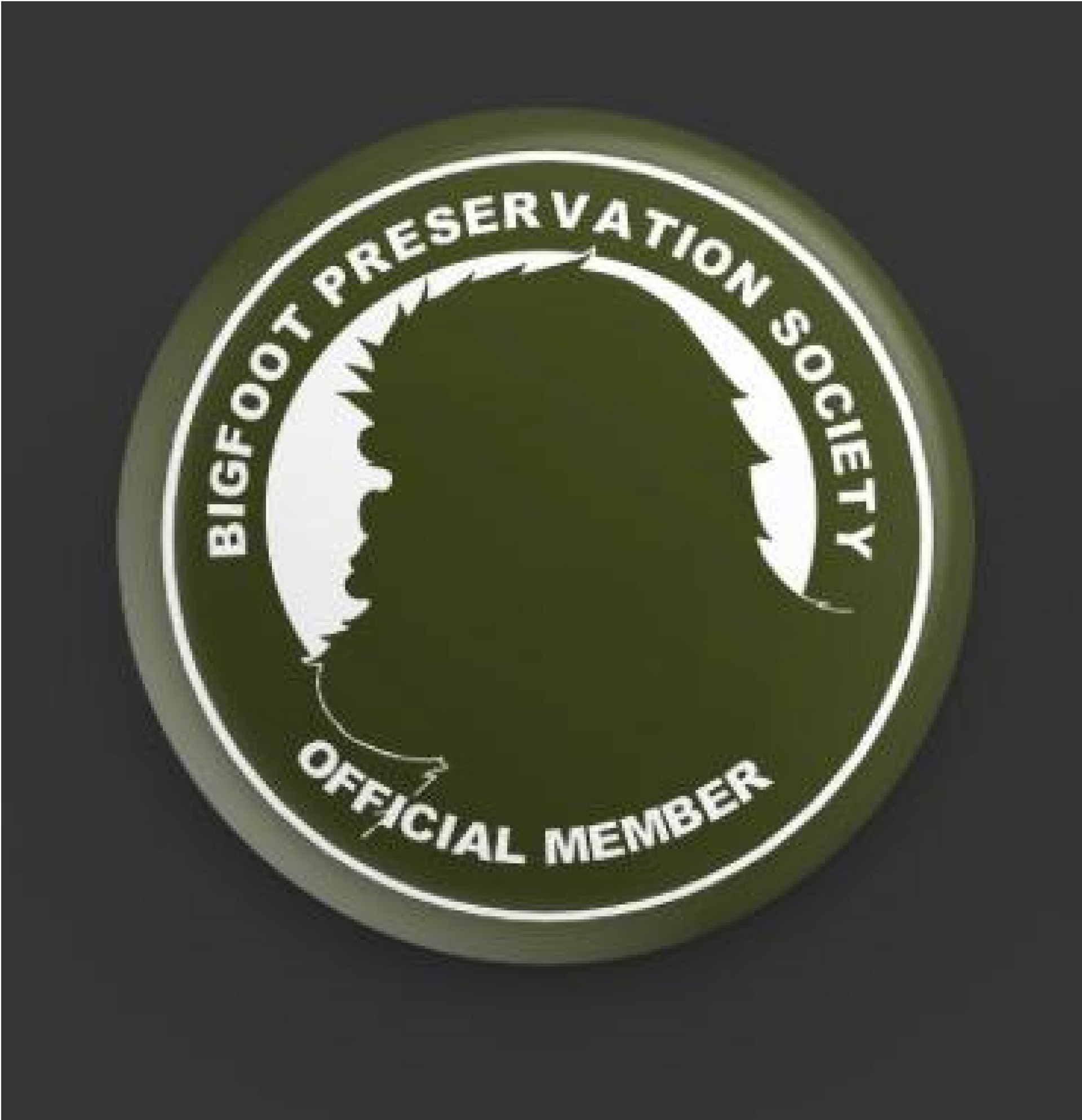 Bigfoot Preservation Society official member badge with green circular design and Bigfoot silhouette