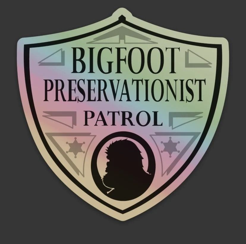 Bigfoot Preservationist Patrol shield logo with pastel gradient background and Bigfoot silhouette