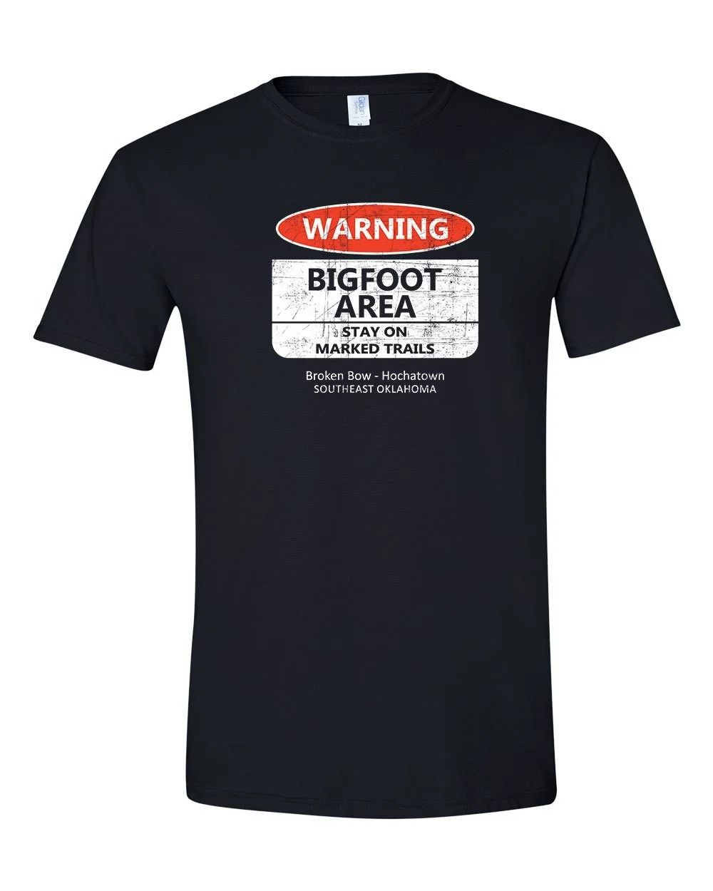 Black T-shirt with “Warning Bigfoot Area” graphic on the front