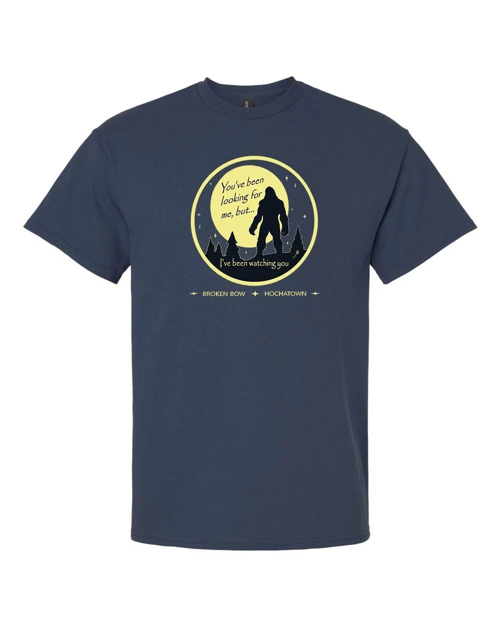Navy T-shirt with a yellow moonlit silhouette graphic on the chest
