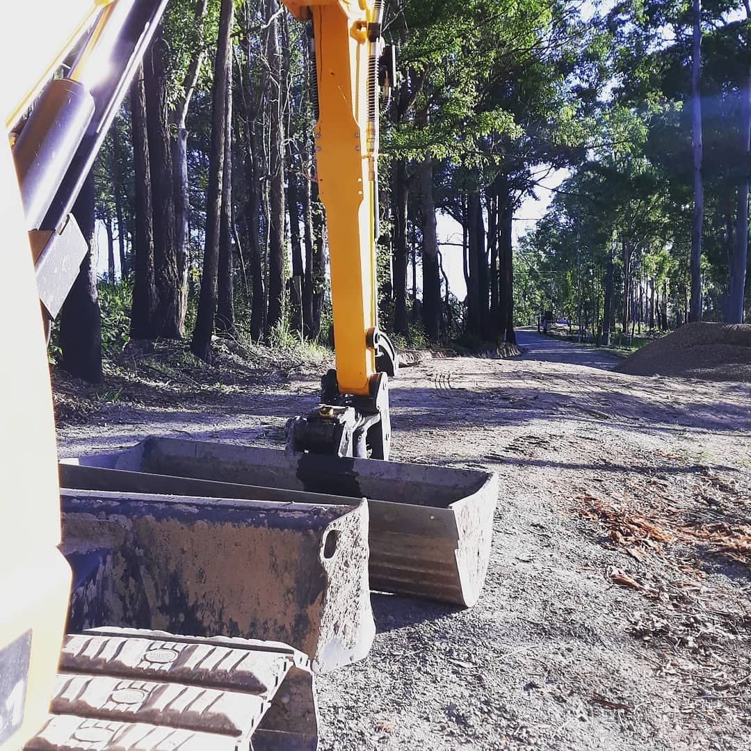 Yellow Excavator — Rainbow Flat, NSW — Tree Solutions NSW