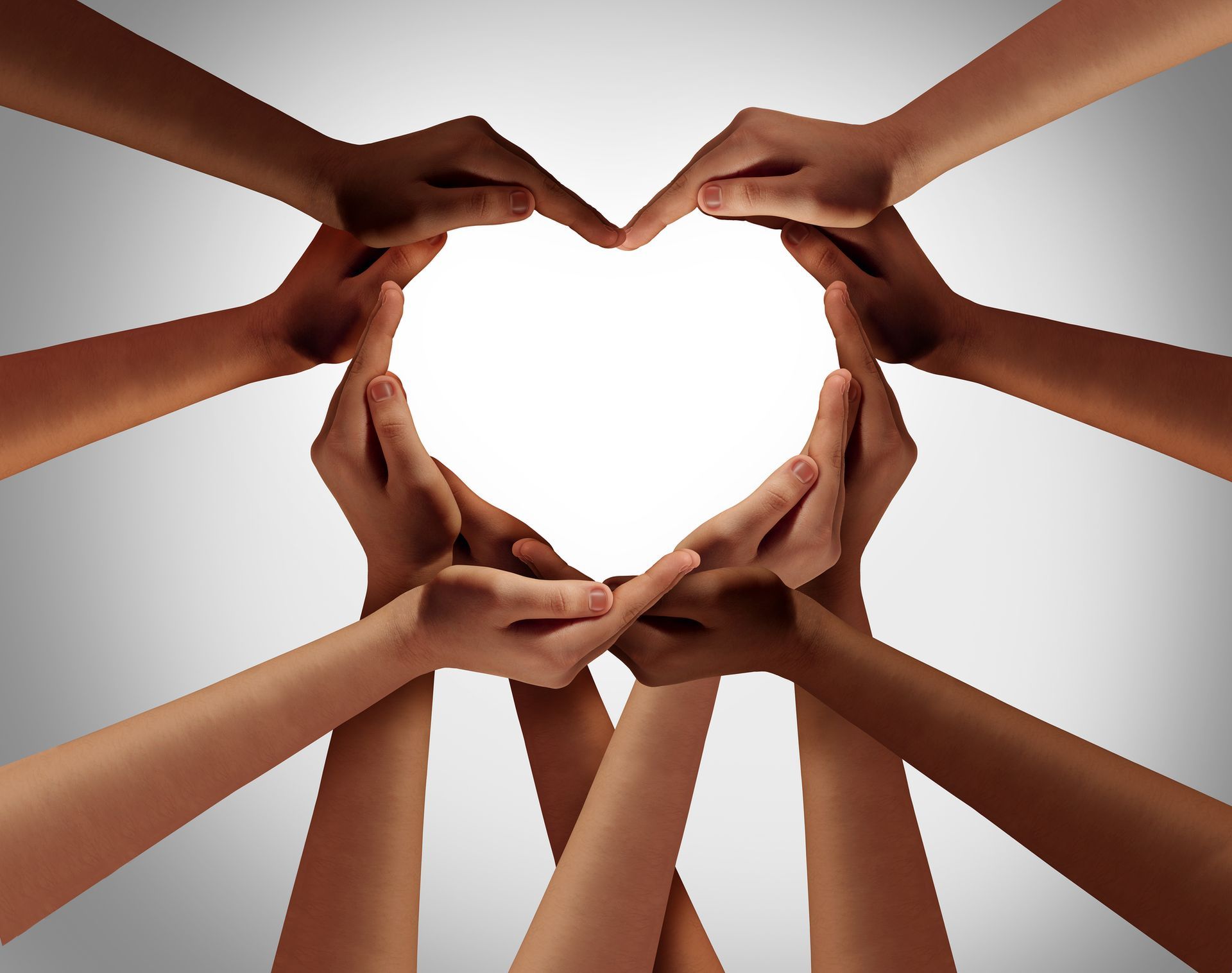 Hands of various skin tones form a heart shape against a white background.