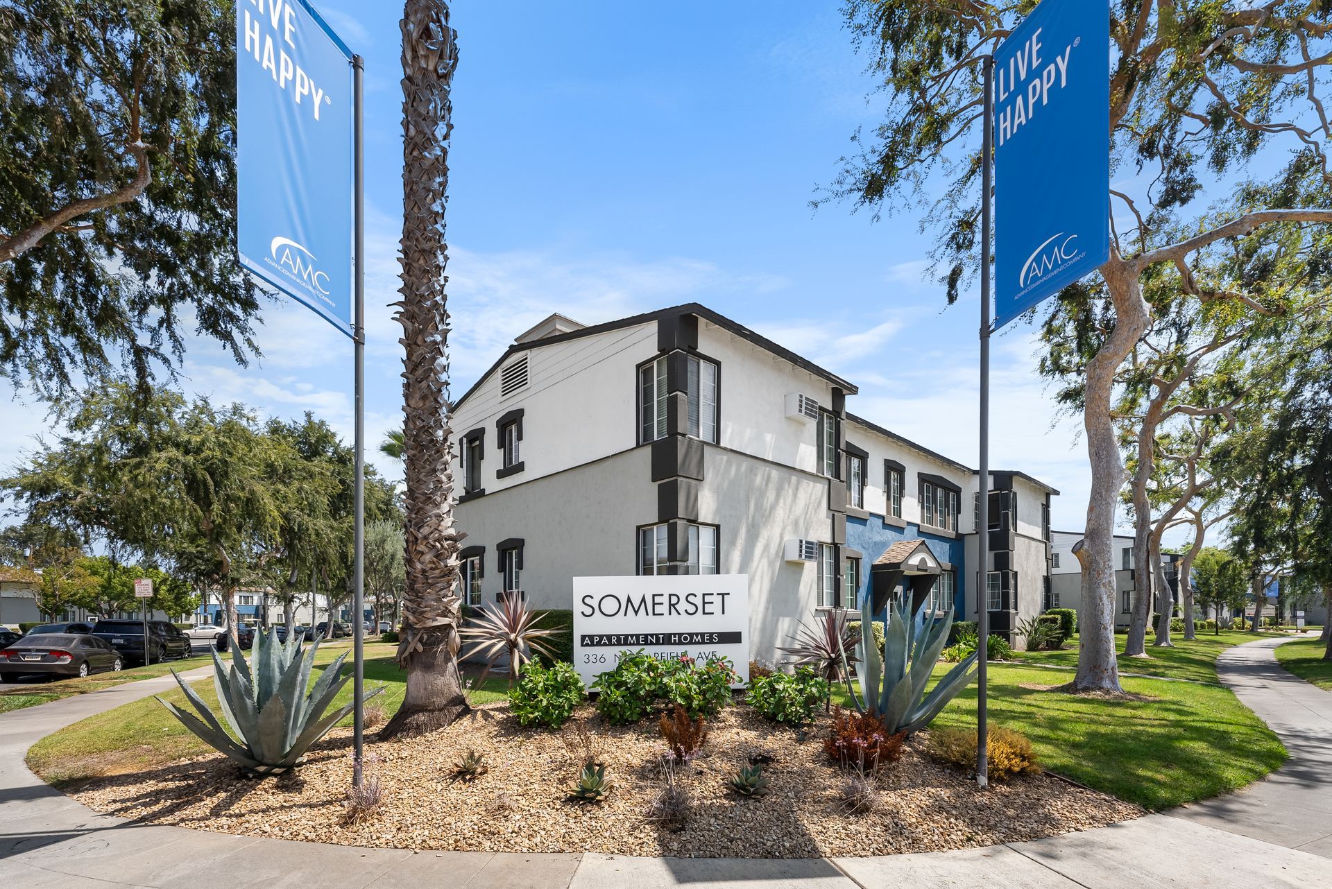 Exterior of building with apartment sign