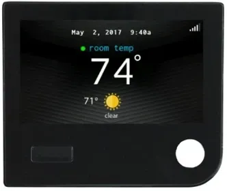 Black thermostat display showing 74° room temp, clear weather, and date/time.