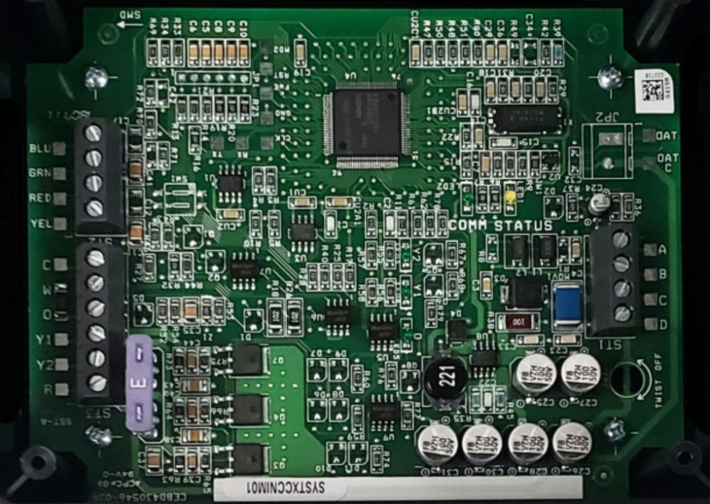 Green circuit board with electronic components and connectors on a white background