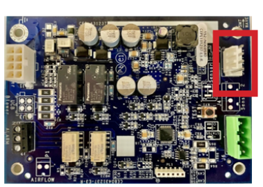Blue circuit board with components, red-highlighted connector on the right edge