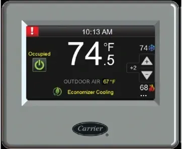 Carrier thermostat display showing 74°F, occupied, and economizer cooling mode