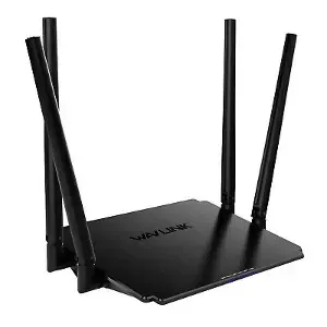 Black NETGEAR Wi‑Fi router with four antennas on a white background