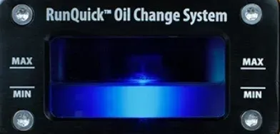RunQuick Oil Change System display with blue-lit center and MAX/MIN level marks