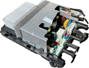 Electronic control module with silver heat sink and exposed internal circuit board on a white background