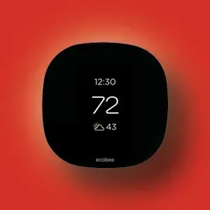 Black Ecobee thermostat displaying 72° on a red background