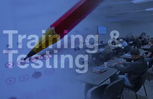 Training and testing presentation in a classroom with seated attendees and a red pen graphic overlay