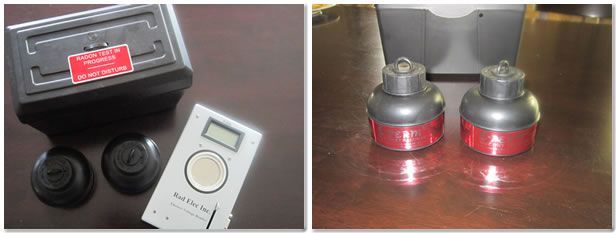 Two sets of medical equipment on a brown surface. One set includes a black box, two black discs, and a digital reader. The second set contains two red and grey objects.