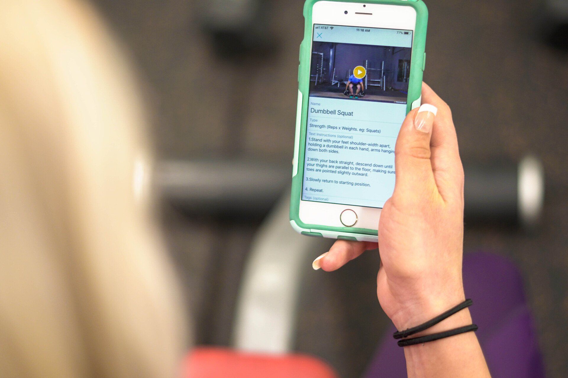 A person is holding a cell phone in their hand.