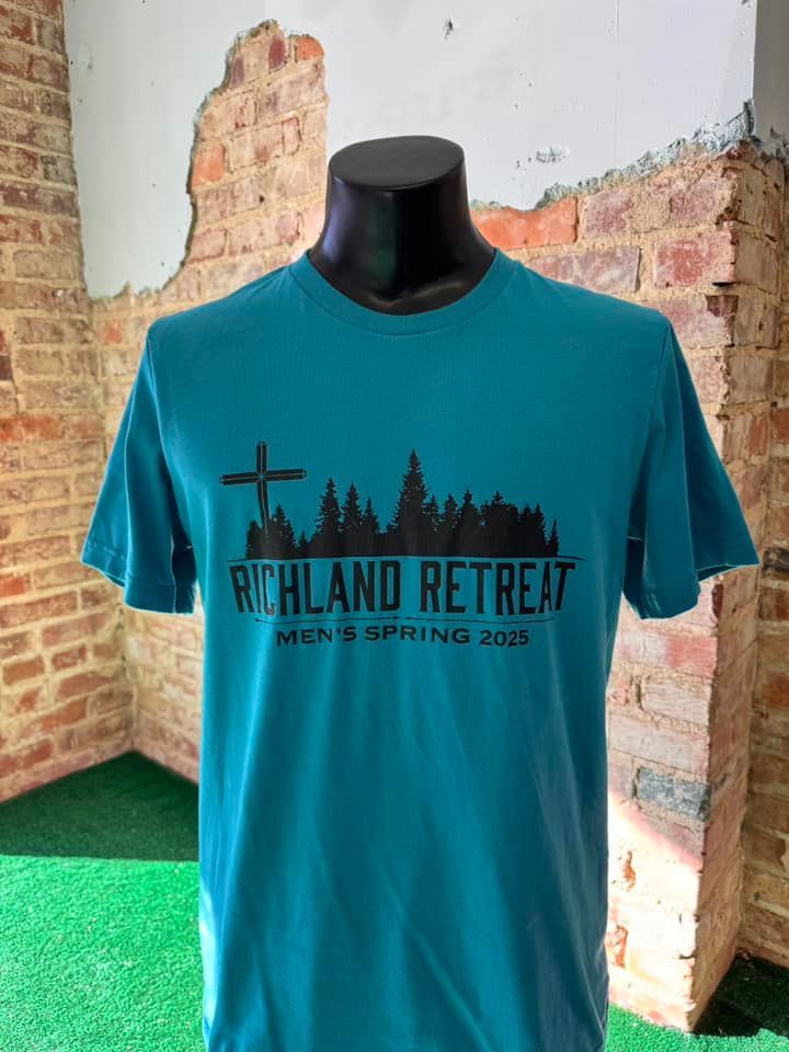 A blue t-shirt with the words richland retreat on it