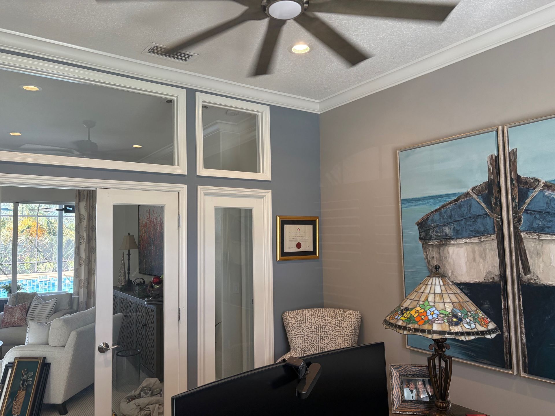 Living room with hand-troweled faux finish walls and tall french doors
