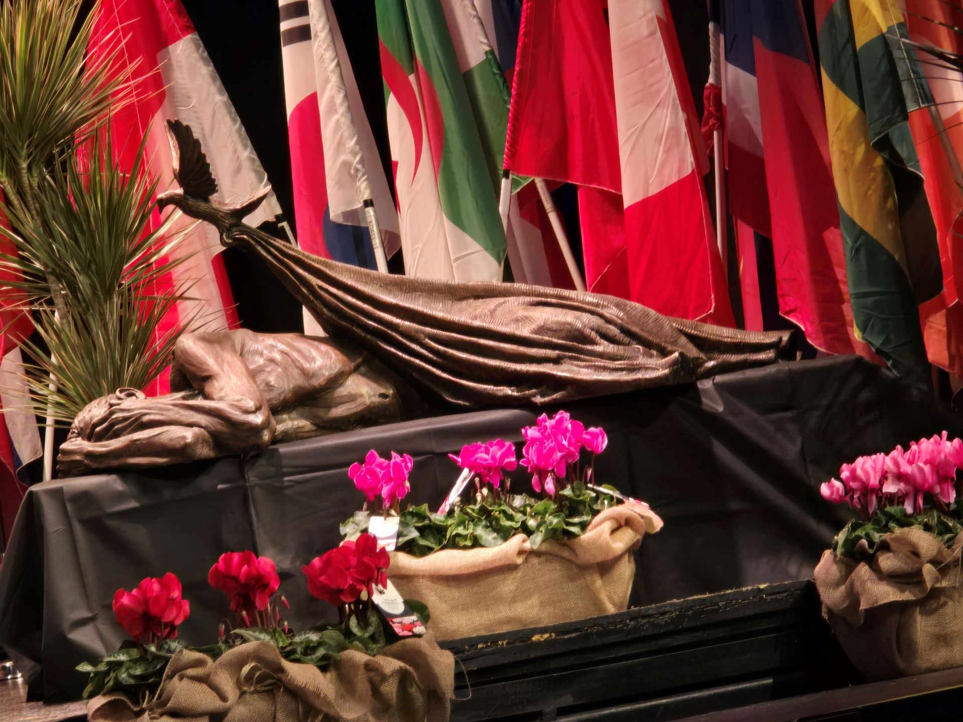 A table with flowers and flags on it