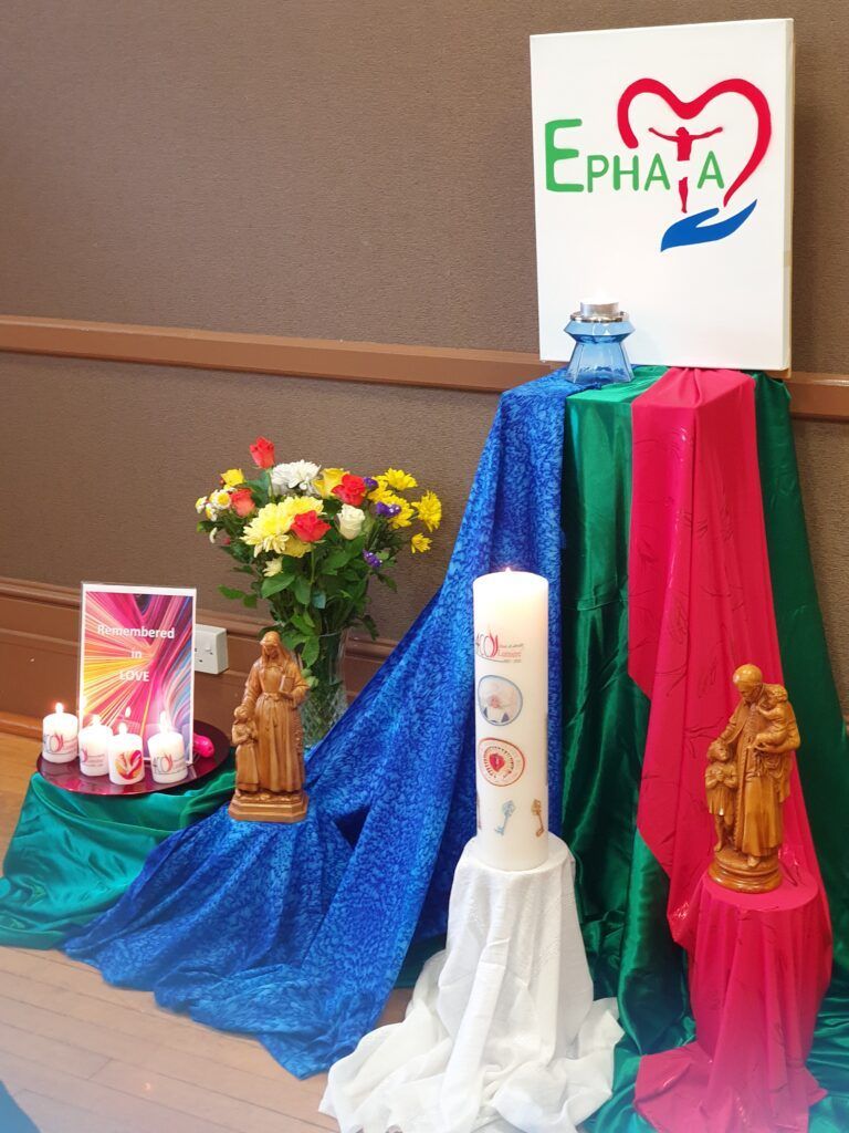 A display with a sign that says ephata on it