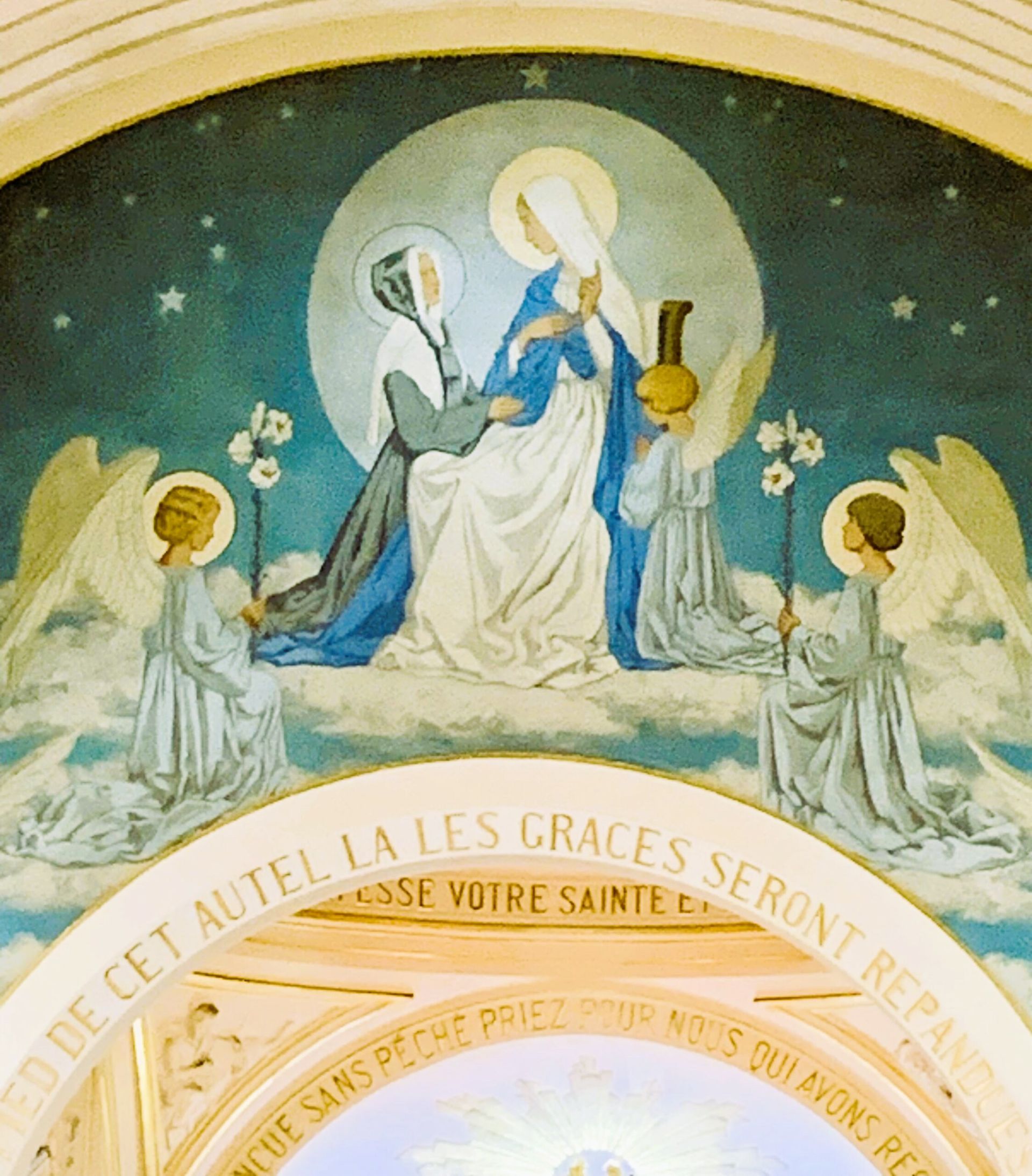 A painting of the virgin mary with angels and the words de cet autel la les graces