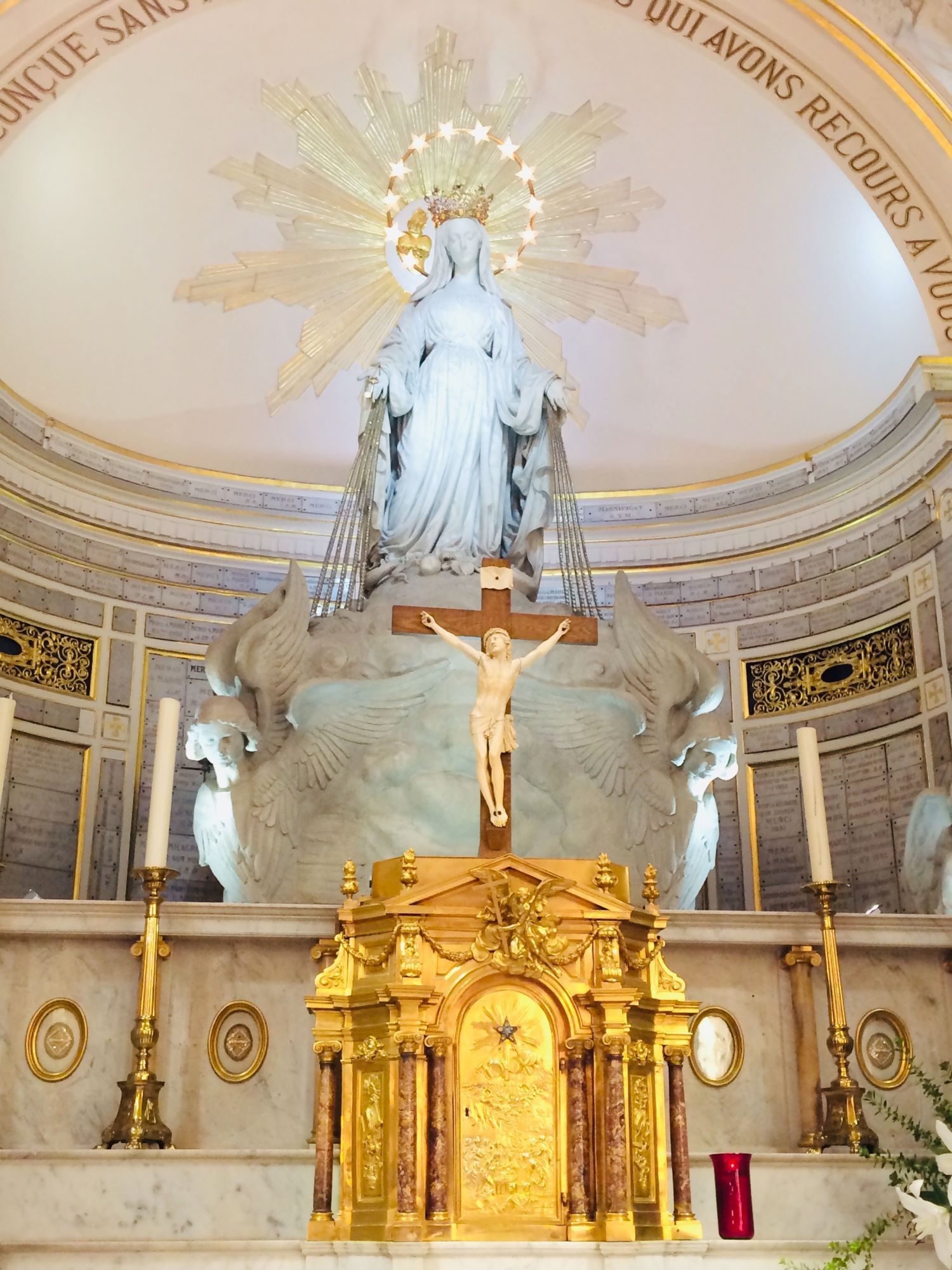 A statue of jesus on a cross in a church