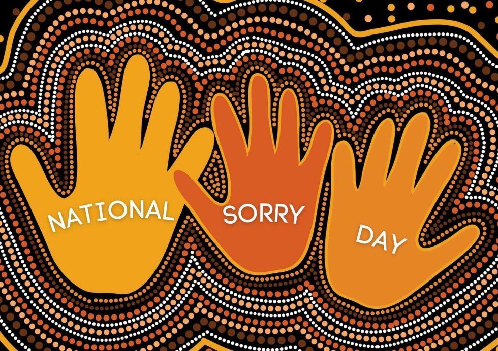 Hands in Aboriginal art style for National Sorry Day, with text overlay.