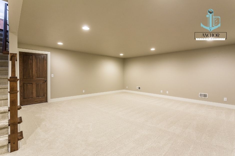 Completed drywall installation project for an open concept drywall basement in Oakville.