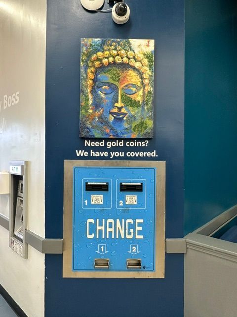 A photo of Wash & Spin Coin Laundry's coin payment system.