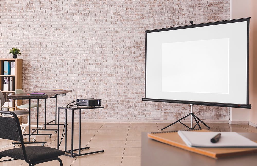 There is a Projector Screen in the Middle of the Room — Frontier Connect in Kingaroy, QLD