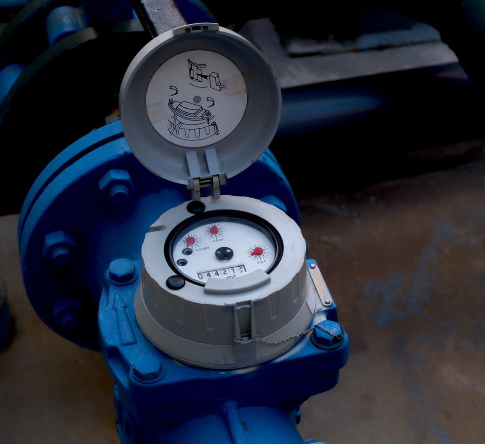 Water Meter With an Open Cover on a Blue Pipe — Forcequip In Glanmire, QLD