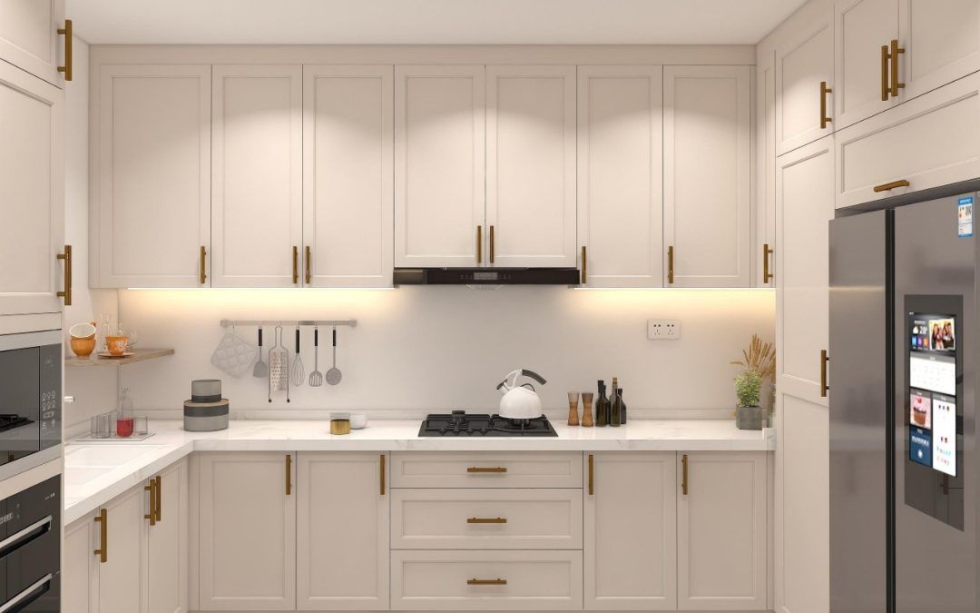 A kitchen with white cabinets , a stove , a refrigerator , and a microwave.