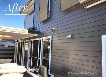 Newly painted gray siding on a house exterior — Stan Painting Services In Thornton, NSW