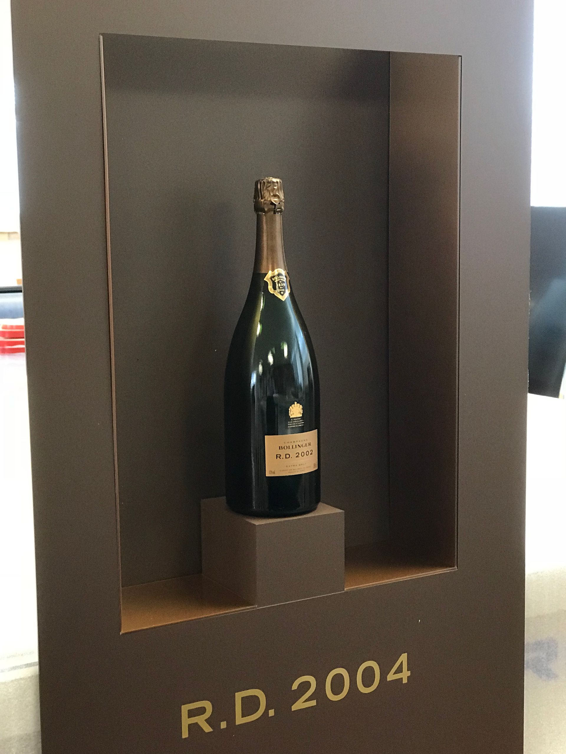 Bollinger window display box with bottle plinth