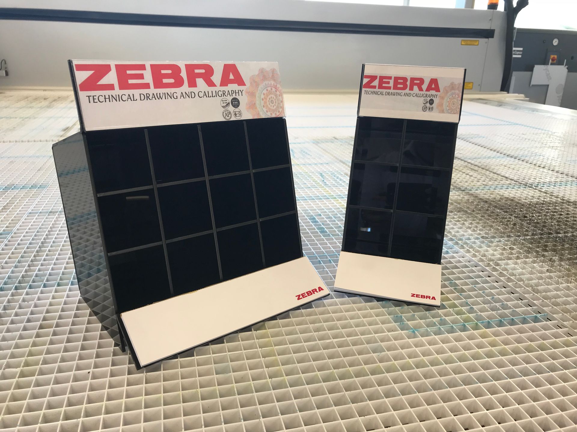 Zebra drawing and calligraphy pen point of sale manufactured in acrylic and printed header panels